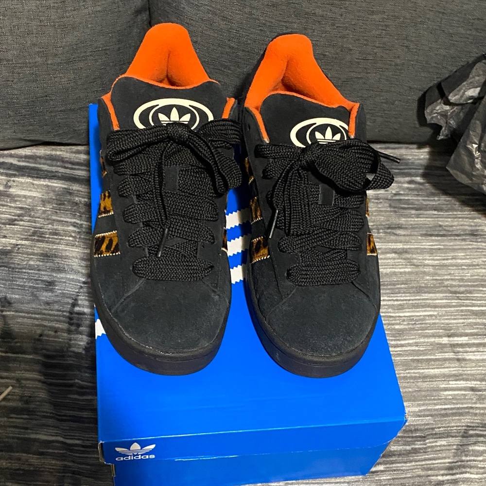 Mens 7/womens 8.  Adidas Black Sneakers with Orange Accents